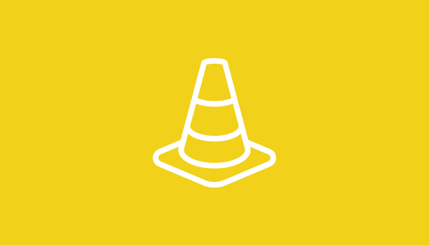 Un pictogramme d’un cône de signalisation.